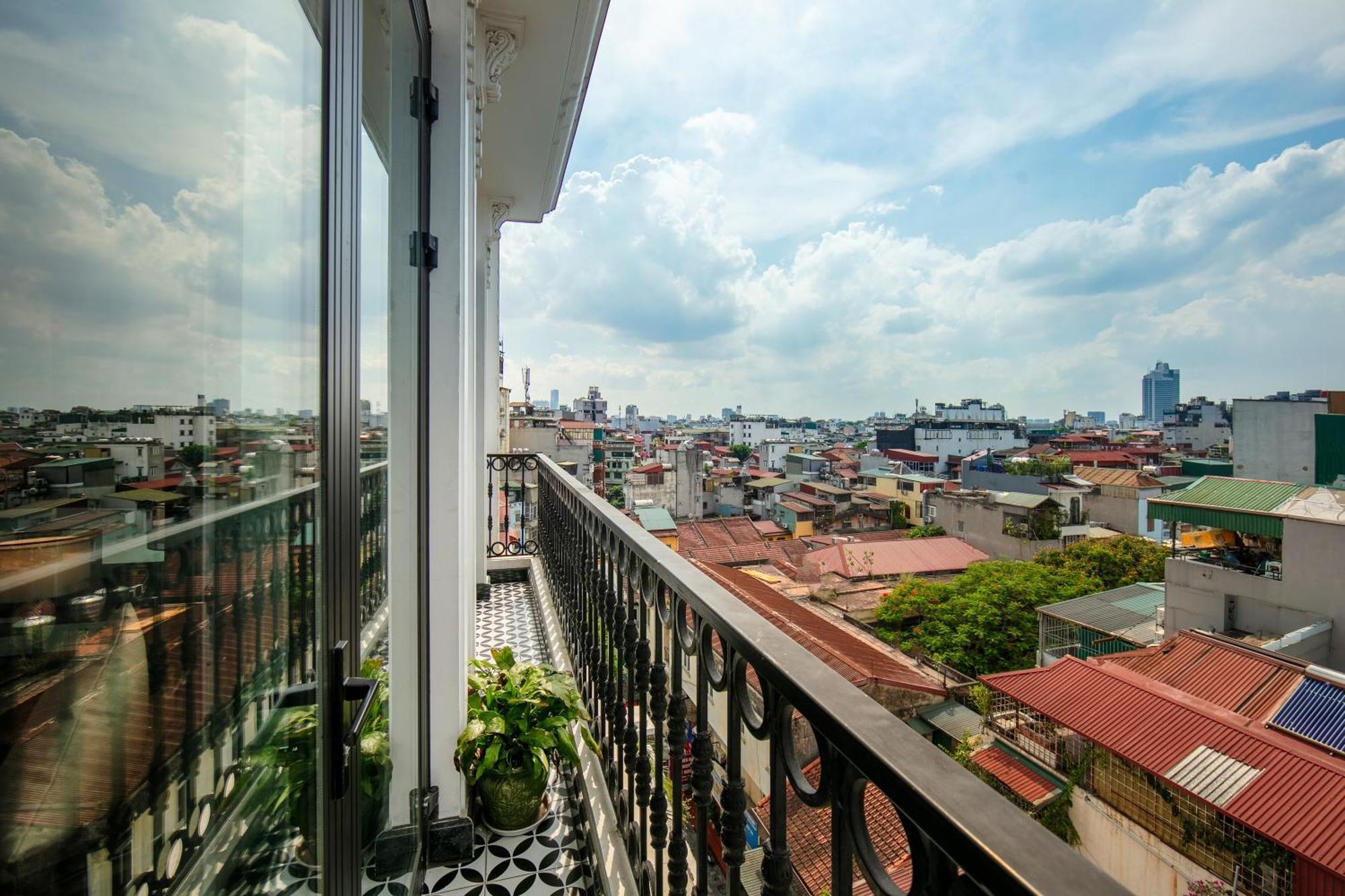 May De Ville Crown Hotel Hanoi Exteriör bild A balcony in Ho Chi Minh City, Vietnam